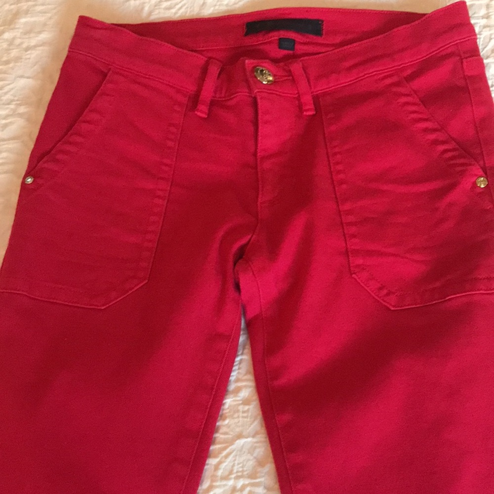 Juicy Couture pink straight crop Jean with gold button detail.